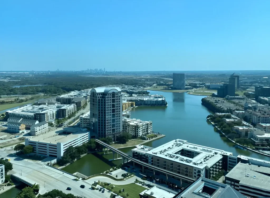 Aerial view of Irving TX urban landscape and waterways, representing businesses served by digital marketing services Irving from Maxobiz.
